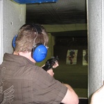 James fires his rifle at the upside down Spanish guy