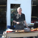 Dad mans the BBQ, the day after the wedding.