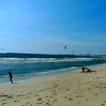 The sky was littered with kite surfers.
