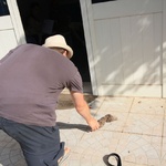 Tom picks up his toy