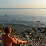 Tom plays throwing rocks