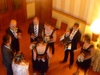 The guests start to mingle downstairs for canapes and cocktails