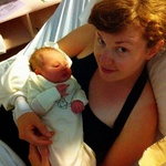 Happy an content with Mum, only 9 hours old.